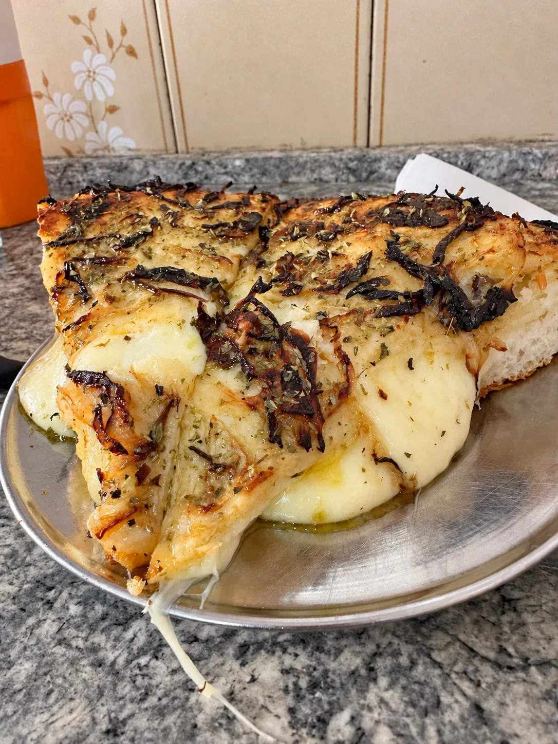 Two pizza slices at La Mezzetta